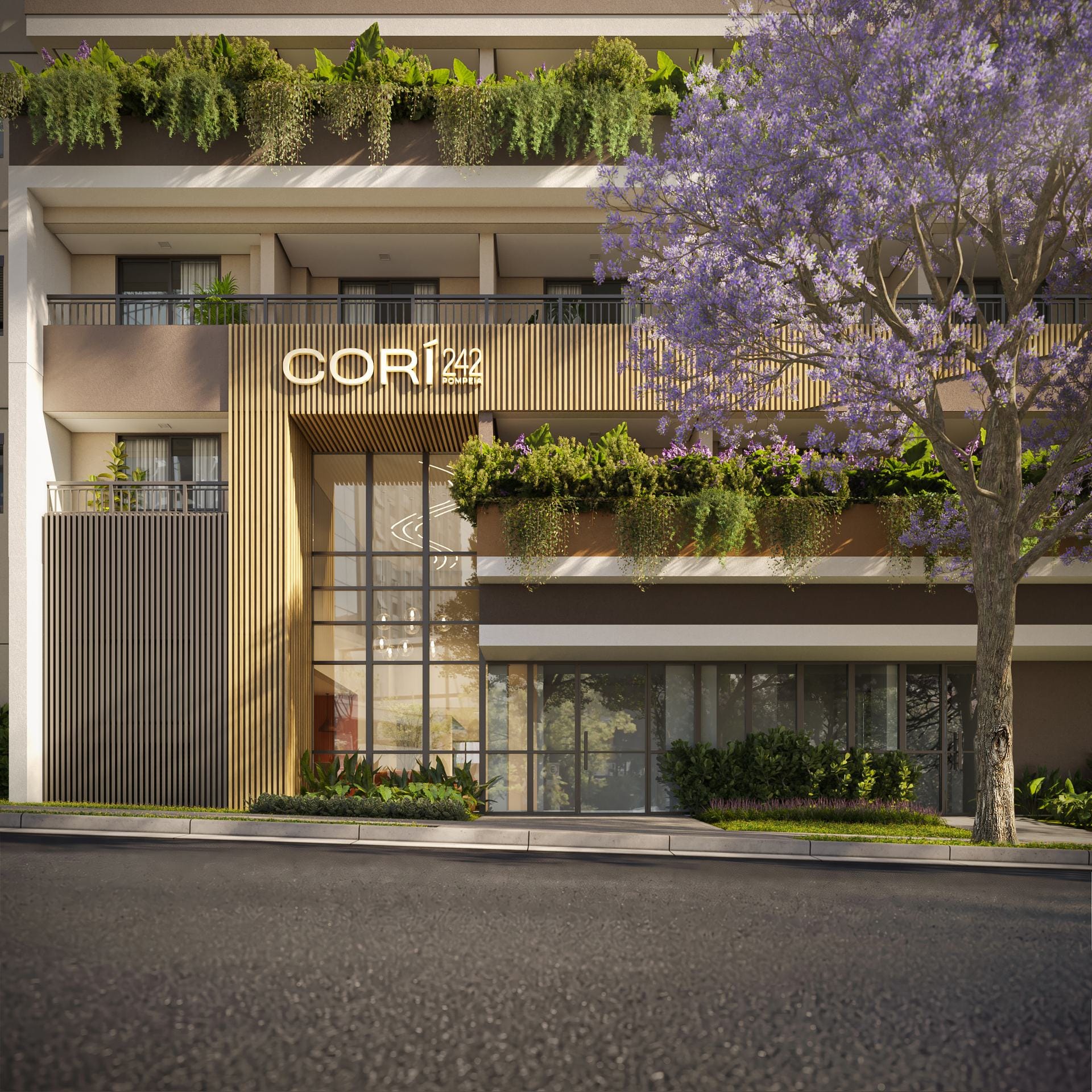 Fachada do Corí 242 durante o dia, com jacarandá na calçada
