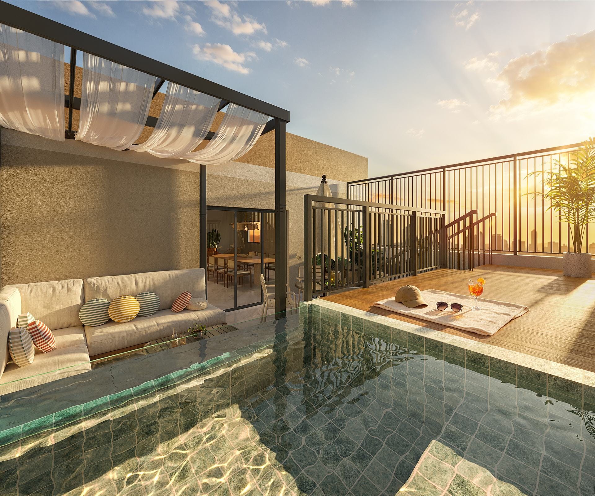 Rooftop com piscina e deck ao pôr do sol
